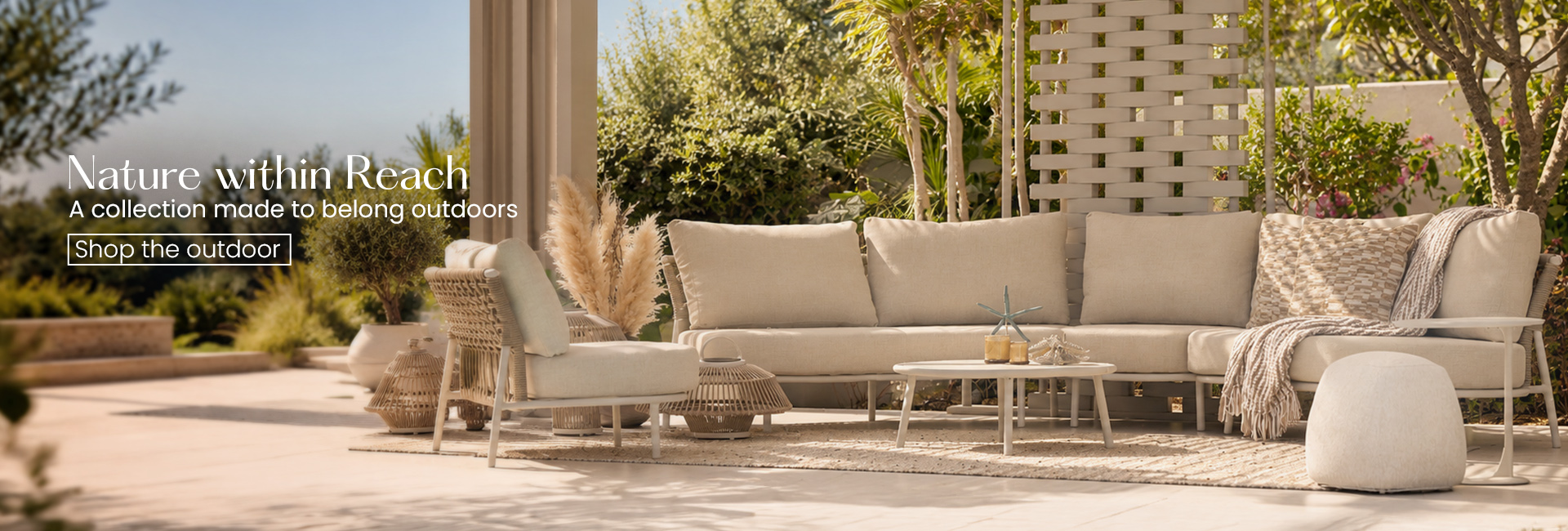 Nature Within Reach outdoor banner with rattan sofa and textured cushions
